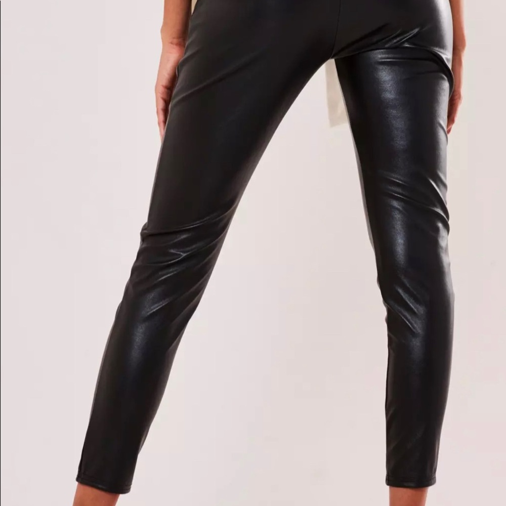Black vegan leather split front leggings